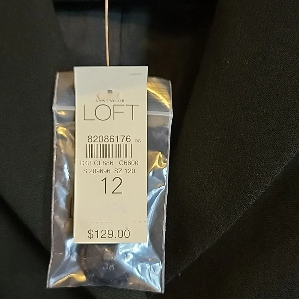 Loft-wool very light blk short blazer with peplum in back Size 12 NWT.